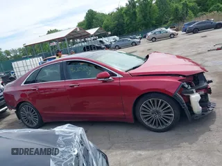 2014 Lincoln MKZ z VIN 3LN6L2G93ER802398, wystawiony jako IAAI lot #42205802 z przebiegiem 187 511 mil mil oraz . Historia ofert i sprzedaży dostępna na DreamBid. Obrazek 13.