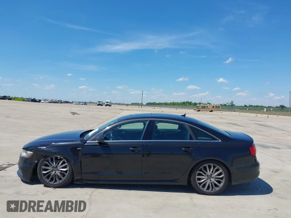 2014 Audi A6 Prestige with VIN WAUHMAFC8EN081609, listed as a IAAI auction lot 42252900 with 170,222 mi miles and . Bid and sale history available at DreamBid. Image 14.