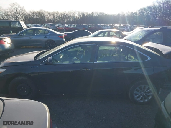 2015 Toyota Camry Hybrid LE with VIN 4T1BD1FK0FU163708, listed as a IAAI auction lot 41766167 with 999,999 mi miles. Bid and sale history available at carsss.com. Image 13.