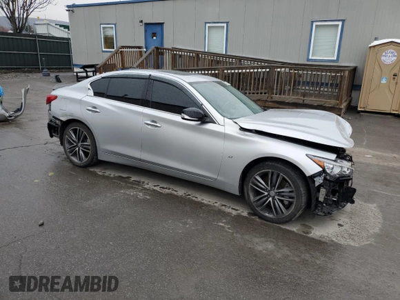 2014 Infiniti Q50 Sport with VIN JN1BV7AR7EM689473, listed as a Copart auction lot 52858085 with 99,395 mi miles and Salvage title. Bid and sale history available at DreamBid. Image 4.