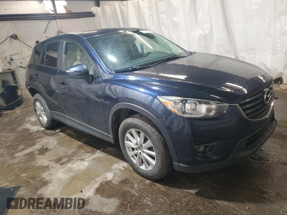 2016 Mazda CX-5 Touring z VIN JM3KE4CY4G0838908, wystawiony jako Copart lot #57961625 z przebiegiem 178 615 mil mil oraz Szkoda całkowita • Salvage title. Historia ofert i sprzedaży dostępna na DreamBid. Obrazek 4.