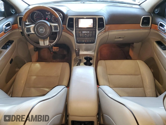 2013 Jeep Grand Cherokee Overland with VIN 1C4RJECG3DC620999, listed as a Copart auction lot 88298985 with 182,219 mi miles and Salvage Title. Bid and sale history available at carsss.com. Image 8.