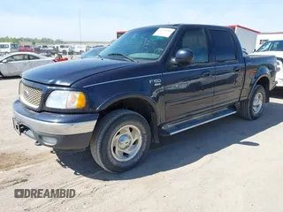 2001 Ford F-150 XLT with VIN 1FTRW08L71KA41543, listed as a IAAI auction lot 42205400 with 69,454 mi miles and . Bid and sale history available at DreamBid. Image 2.