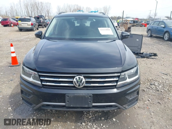 2021 Volkswagen Tiguan SE with VIN 3VV2B7AX4MM050282, listed as a IAAI auction lot 42124808 with 80,082 mi miles and . Bid and sale history available at DreamBid. Image 13.