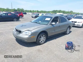 2003 Mercury Sable LS Premium with VIN 1MEHM55S23G627680, listed as a IAAI auction lot 42234566 with 97,097 mi miles and . Bid and sale history available at DreamBid. Image 2.