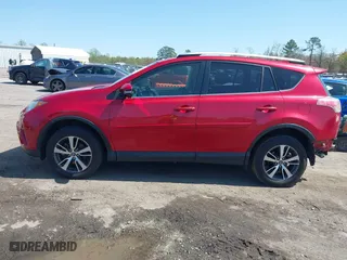 2016 Toyota RAV4 XLE with VIN JTMWFREV6GJ099056, listed as a IAAI auction lot 41941541 with 137,154 mi miles. Bid and sale history available at carsss.com. Image 14.