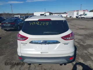 2016 Ford Escape Titanium with VIN 1FMCU9J96GUB65441, listed as a IAAI auction lot 41412223 with 74,218 mi miles. Bid and sale history available at carsss.com. Image 16.