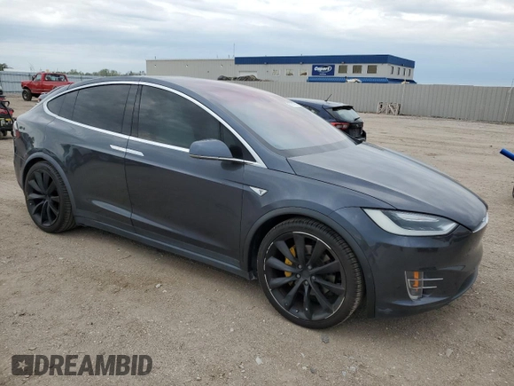 2016 Tesla Model X 70D z VIN 5YJXCAE29GF006512, wystawiony jako Copart lot #57517885 z przebiegiem Nie podano mil oraz Szkoda całkowita • Salvage title. Historia ofert i sprzedaży dostępna na DreamBid. Obrazek 4.