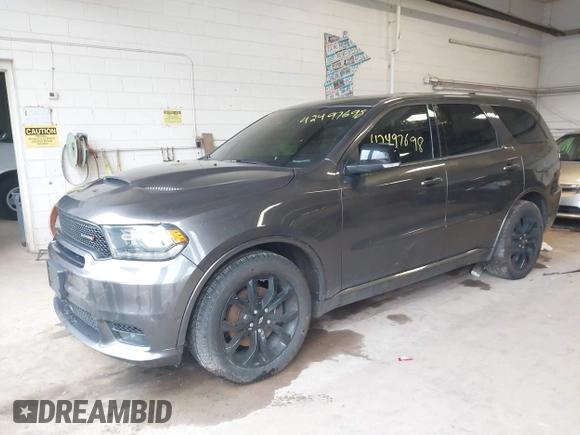 2019 Dodge Durango R/T with VIN 1C4SDJCT0KC550809, listed as a IAAI auction lot 42497698 with 97,236 mi miles and . Bid and sale history available at DreamBid. Image 16.