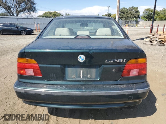 2000 BMW 5 Series 528iA with VIN WBADM6345YGU18707, listed as a Copart auction lot 63293814 with 0 mi miles and Salvage Title. Bid and sale history available at carsss.com. Image 6.