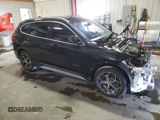 2018 BMW X1 xDrive28i with VIN WBXHT3C35J5K30657, listed as a Copart auction lot 43612815 with 61,181 mi miles and Salvage Title. Bid and sale history available at carsss.com. Image 4.