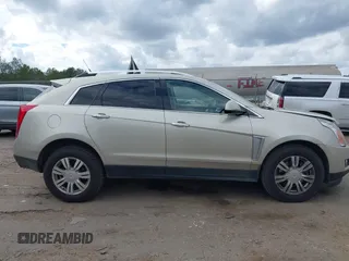 2014 Cadillac SRX Luxury Collection with VIN 3GYFNBE38ES518054, listed as a IAAI auction lot 41520886 with 108,905 mi miles and . Bid and sale history available at DreamBid. Image 13.