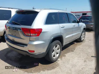 2012 Jeep Grand Cherokee Laredo with VIN 1C4RJEAG4CC167557, listed as a IAAI auction lot 42047720 with 195,631 mi miles. Bid and sale history available at carsss.com. Image 4.