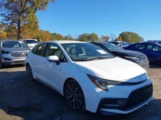 2021 Toyota Corolla SE with VIN 5YFS4MCE7MP061482, listed as a IAAI auction lot 40829549 with 137,629 mi miles. Bid and sale history available at carsss.com. Image 1.