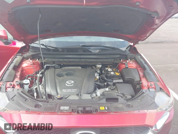 2019 Mazda CX-5 Sport with VIN JM3KFABM5K0627087, listed as a IAAI auction lot 42163866 with 38,050 mi miles and . Bid and sale history available at DreamBid. Image 10.