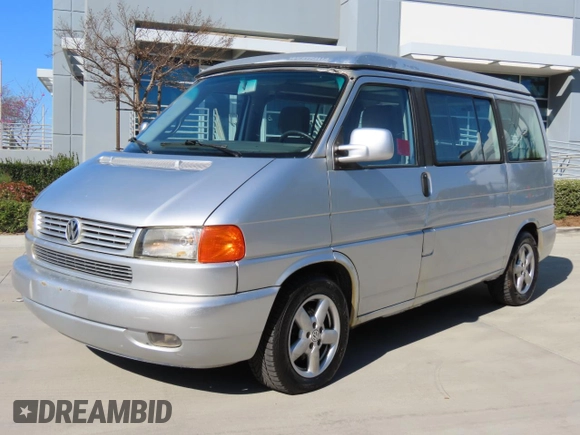 2003 Volkswagen EuroVan MV с VIN WV2NB47003H003033, выставлен на аукционе Copart как лот 47059195 с пробегом 164 173 миль миль и Чистый • Clean title. История ставок и продаж доступна на DreamBid. Изображение 2.