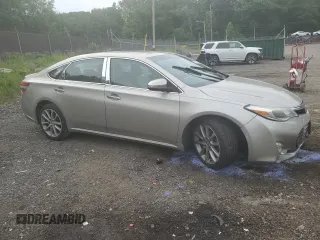 2014 Toyota Avalon Limited z VIN 4T1BK1EB7EU079438, wystawiony jako Copart lot #56710265 z przebiegiem 132 762 mil mil oraz Szkoda całkowita • Salvage title. Historia ofert i sprzedaży dostępna na DreamBid. Obrazek 4.