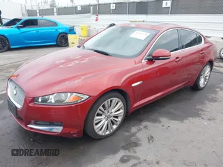 2012 Jaguar XF Portfolio with VIN SAJWA0HB5CLS21062, listed as a IAAI auction lot 41733179 with 125,614 mi miles. Bid and sale history available at carsss.com. Image 2.