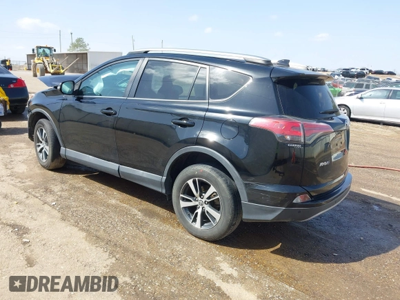 2018 Toyota RAV4 XLE with VIN 2T3WFREVXJW444002, listed as a IAAI auction lot 41795600 with 115,120 mi miles. Bid and sale history available at carsss.com. Image 3.