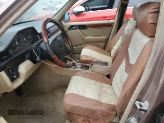 1993 Mercedes-Benz 400 with VIN WDBEA34EXPB944380, listed as a Copart auction lot 73791114 with 143,014 mi miles and Salvage Title. Bid and sale history available at carsss.com. Image 7.