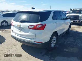2018 Chevrolet Equinox LS with VIN 2GNAXHEV7J6293821, listed as a IAAI auction lot 41475150 with 80,785 mi miles and . Bid and sale history available at DreamBid. Image 4.
