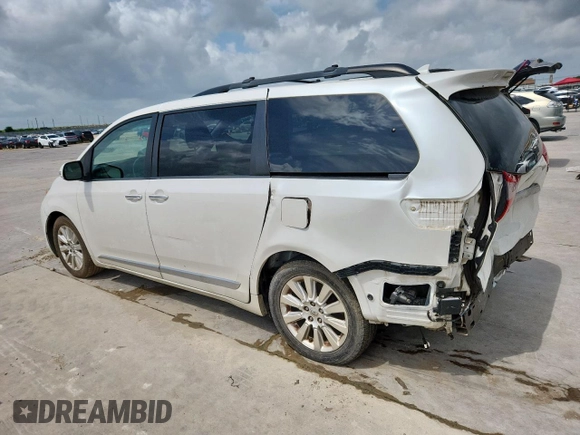 2015 Toyota Sienna XLE with VIN 5TDYK3DC4FS617099, listed as a Copart auction lot 61128025 with 114,508 mi miles and Salvage title. Bid and sale history available at DreamBid. Image 2.