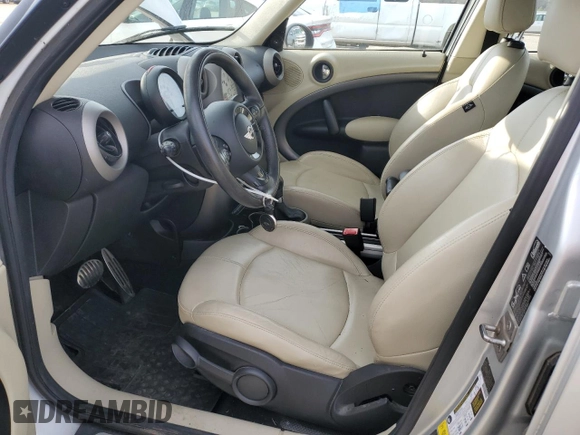 2012 MINI Countryman S with VIN WMWZC5C54CWL59076, listed as a Copart auction lot 48201505 with 172,253 mi miles and Salvage Title. Bid and sale history available at DreamBid. Image 7.