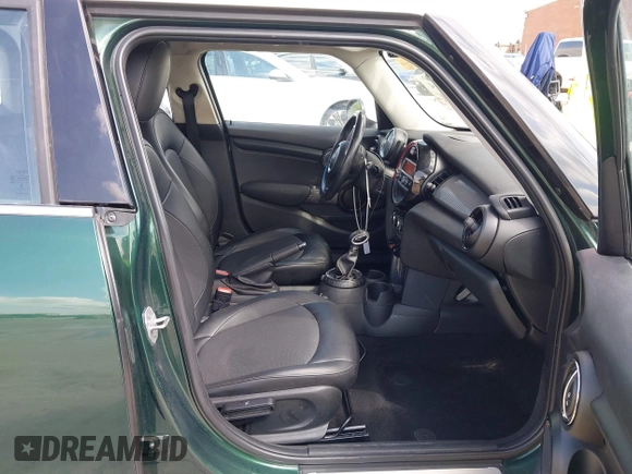 2016 MINI Hardtop 4 Door with VIN WMWXU1C52G2D10035, listed as a IAAI auction lot 42190544 with 106,383 mi miles and . Bid and sale history available at DreamBid. Image 5.