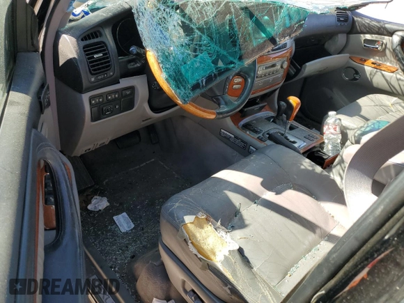 2004 Lexus LX 470 with VIN JTJHT00W043536558, listed as a Copart auction lot 48498305 with Not Provided miles and Salvage Title. Bid and sale history available at DreamBid. Image 8.