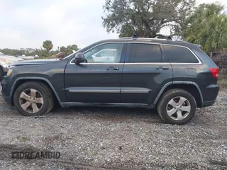 2011 Jeep Grand Cherokee Laredo z VIN 1J4RR4GG2BC737140, wystawiony jako IAAI lot #41217587 z przebiegiem Nie podano mil oraz . Historia ofert i sprzedaży dostępna na DreamBid. Obrazek 14.