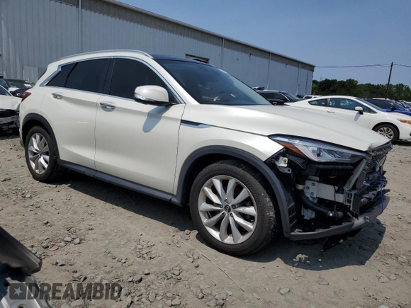 2019 Infiniti QX50 Essential with VIN 3PCAJ5M3XKF117589, listed as a Copart auction lot 58156705 with 59,554 mi miles and Salvage title. Bid and sale history available at DreamBid. Image 4.