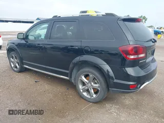 2017 Dodge Journey Crossroad Plus z VIN 3C4PDCGGXHT590777, wystawiony jako IAAI lot #42409090 z przebiegiem 139 219 mil mil oraz . Historia ofert i sprzedaży dostępna na DreamBid. Obrazek 3.