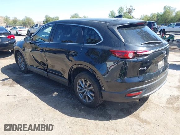 2020 Mazda CX-9 Sport with VIN JM3TCABY8L0407430, listed as a IAAI auction lot 42288490 with 50,317 mi miles and . Bid and sale history available at DreamBid. Image 3.