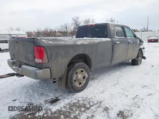 2014 Ram 2500 SLT with VIN 3C6TR5JT5EG203839, listed as a IAAI auction lot 41277795 with 135,344 mi miles and . Bid and sale history available at DreamBid. Image 4.