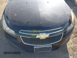 2013 Chevrolet Cruze 1LT with VIN 1G1PC5SB0D7111476, listed as a IAAI auction lot 42088469 with 70,581 mi miles and . Bid and sale history available at DreamBid. Image 6.