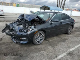 2021 BMW 2 Series 228i with VIN WBA53AK02M7J27133, listed as a Copart auction lot 41282854 with 13,897 mi miles. Bid and sale history available at carsss.com. Image 1.