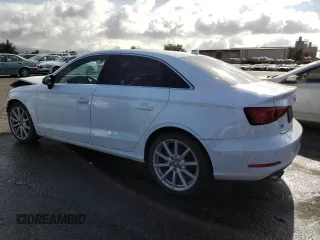 2016 Audi A3 1.8T Premium Plus with VIN WAUC7GFFXG1042576, listed as a Copart auction lot 77613214 with 81,684 mi miles and Salvage Title. Bid and sale history available at carsss.com. Image 2.