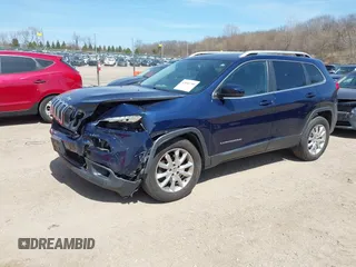 2015 Jeep Cherokee Limited with VIN 1C4PJMDS5FW649720, listed as a IAAI auction lot 42046740 with 158,147 mi miles. Bid and sale history available at carsss.com. Image 2.