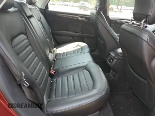 2013 Ford Fusion SE Hybrid z VIN 3FA6P0LUXDR335590, wystawiony jako Copart lot #60541395 z przebiegiem 121 975 mil mil oraz Szkoda całkowita • Salvage title. Historia ofert i sprzedaży dostępna na DreamBid. Obrazek 10.