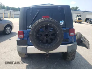 2009 Jeep Wrangler Sahara with VIN 1J4FA54199L747528, listed as a Copart auction lot 80974584 with 226,299 mi miles and Salvage title. Bid and sale history available at DreamBid. Image 6.