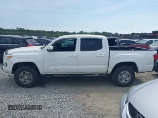 2022 Toyota Tacoma SR with VIN 3TYCZ5AN9NT098903, listed as a IAAI auction lot 42088505 with 93,000 mi miles and . Bid and sale history available at DreamBid. Image 14.