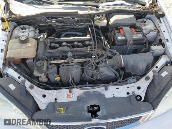 2007 Ford Focus S z VIN 1FAHP34N07W331020, wystawiony jako Copart lot #45483515 z przebiegiem 80 981 mil mil oraz Czysty tytuł • Clean title. Historia ofert i sprzedaży dostępna na DreamBid. Obrazek 11.