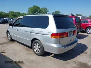 2004 Honda Odyssey EX-L with VIN 5FNRL18934B018040, listed as a IAAI auction lot 42241081 with 250,607 mi miles and . Bid and sale history available at DreamBid. Image 3.