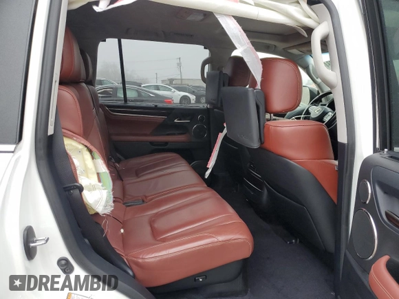 2018 Lexus LX 570 z VIN JTJHY7AX7J4257535, wystawiony jako Copart lot #83635384 z przebiegiem 67 720 mil mil oraz Szkoda całkowita • Salvage title. Historia ofert i sprzedaży dostępna na DreamBid. Obrazek 11.