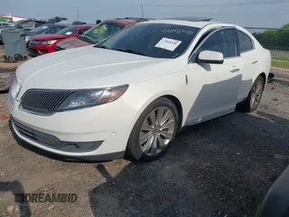 2013 Lincoln MKS EcoBoost with VIN 1LNHL9FT3DG605011, listed as a IAAI auction lot 42018348 with 110,701 mi miles and . Bid and sale history available at DreamBid. Image 2.