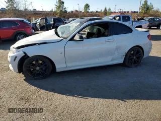 2014 BMW 2 Series M235i with VIN WBA1J7C52EVW84400, listed as a Copart auction lot 88859945 with 0 mi miles and Salvage Title. Bid and sale history available at carsss.com. Image 1.