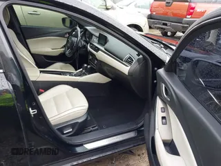 2017 Mazda 6 Grand Touring with VIN JM1GL1X54H1131788, listed as a IAAI auction lot 41640785 with 181,561 mi miles. Bid and sale history available at carsss.com. Image 5.