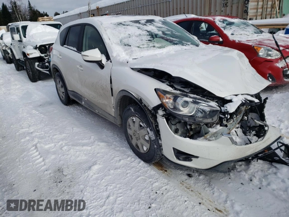 2016 Mazda CX-5 Touring z VIN JM3KE4CY1G0703496, wystawiony jako Copart lot #43806525 z przebiegiem Nie podano mil oraz Szkoda całkowita • Salvage title. Historia ofert i sprzedaży dostępna na DreamBid. Obrazek 4.