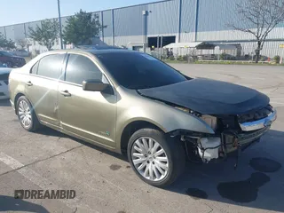 2012 Ford Fusion Hybrid with VIN 3FADP0L39CR302321, listed as a IAAI auction lot 40015708 with 161,249 mi miles and . Bid and sale history available at DreamBid. Image 1.