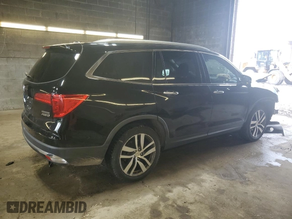 2017 Honda Pilot Touring z VIN 5FNYF6H91HB011030, wystawiony jako Copart lot #60236875 z przebiegiem 119 909 mil mil oraz Szkoda całkowita • Salvage title. Historia ofert i sprzedaży dostępna na DreamBid. Obrazek 3.